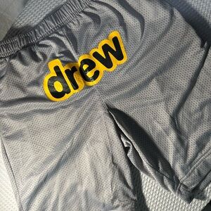 Gray Mesh Shorts with Yellow Logo